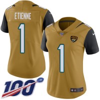 Nike Jacksonville Jaguars #1 Travis Etienne Gold Women's Stitched NFL Limited Rush 100th Season Jersey