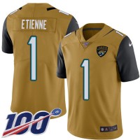 Nike Jacksonville Jaguars #1 Travis Etienne Gold Men's Stitched NFL Limited Rush 100th Season Jersey